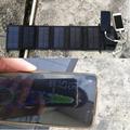 Caricatore solare pieghevole da 20W con doppia porta USB e cavo di ricarica 10 in 1 - Nero