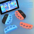 Protezioni per le nocche da boxe per 2 controller Joy-Con di Nintendo Switch - 2 pezzi - Arancione / Blu