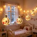 Luci LED a catena natalizie con pupazzi di neve e palline trasparenti – 10 LED bianco caldo - 2m