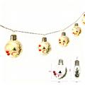 Luci LED a catena natalizie con pupazzi di neve e palline trasparenti – 10 LED bianco caldo - 2m