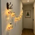 Luci LED a catena natalizie con pupazzi di neve e palline trasparenti – 10 LED bianco caldo - 2m