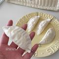 Simpatico peluche antistress a forma di gnocchetto con portachiavi - Bianco