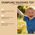 Giocattolo squishy dumpling con espressione degli occhi e cestello per cottura a vapore - Blu