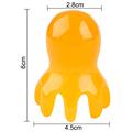 Spazzola massaggiante flessibile per cuoio capelluto Octopus - Gialla