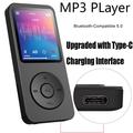 Lettore musicale MP4 portatile T1 con schermo da 1.8" e scheda TF da 64GB