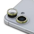 Protezione per obiettivo della fotocamera Guess Fixed Glitter per iPhone 16/16 Plus - Oro