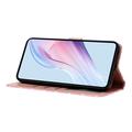 Custodia a portafoglio per iPhone 16 Plus con motivo a pois - Rosa