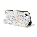 Custodia a portafoglio floreale rombica per iPhone 16e/17e - Fiori colorati