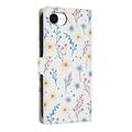 Custodia a portafoglio floreale rombica per iPhone 16e/17e - Fiori colorati