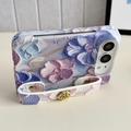 Custodia per iPhone Duo con motivo floreale in acquerello in rilievo e cinturino da polso - Blu
